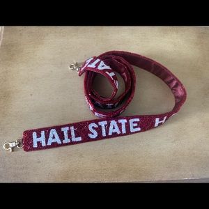 New without tags Mississippi State maroon and white beaded purse strap